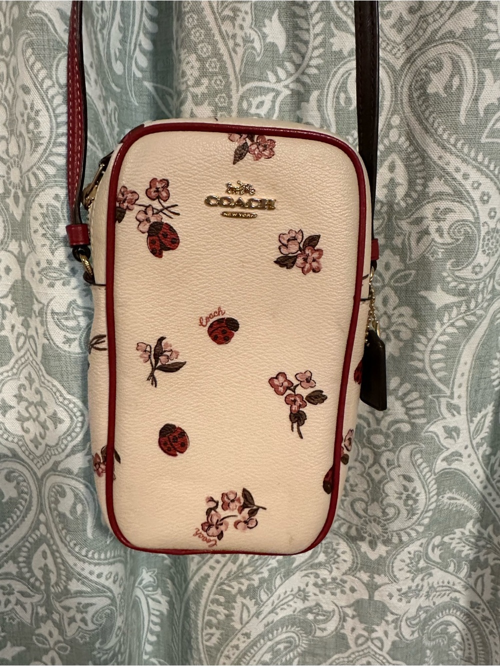 Coach Cream Floral & Ladybug Crossbody Phone Bag with Red Trim